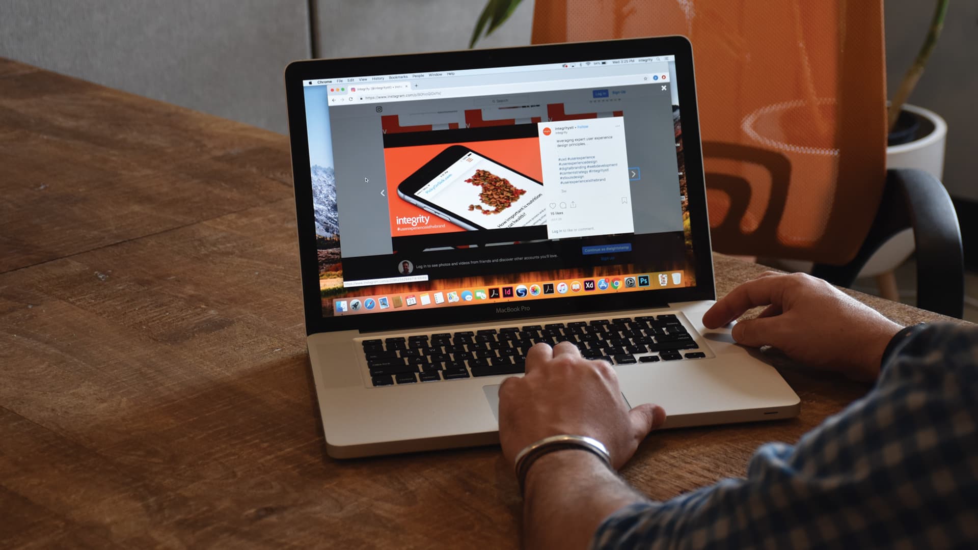 Laptop that shows an instagram post from STL Digital Marketing Agency Integrity's feed