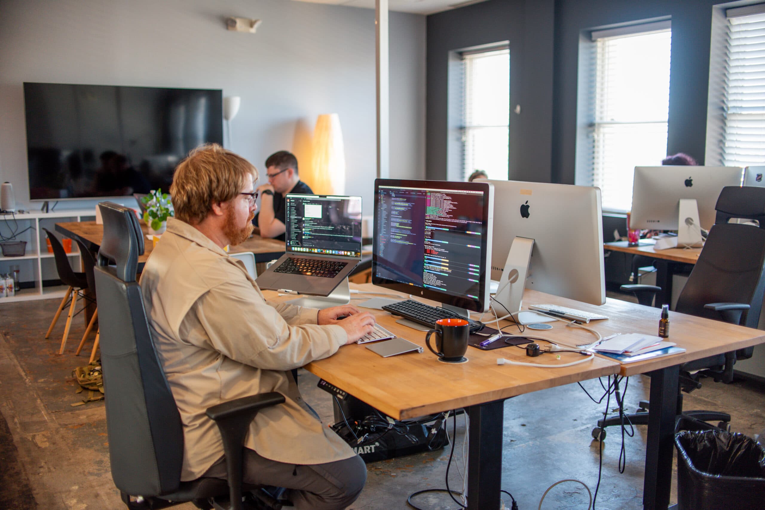 Integrity St Louis employees working in open office environment