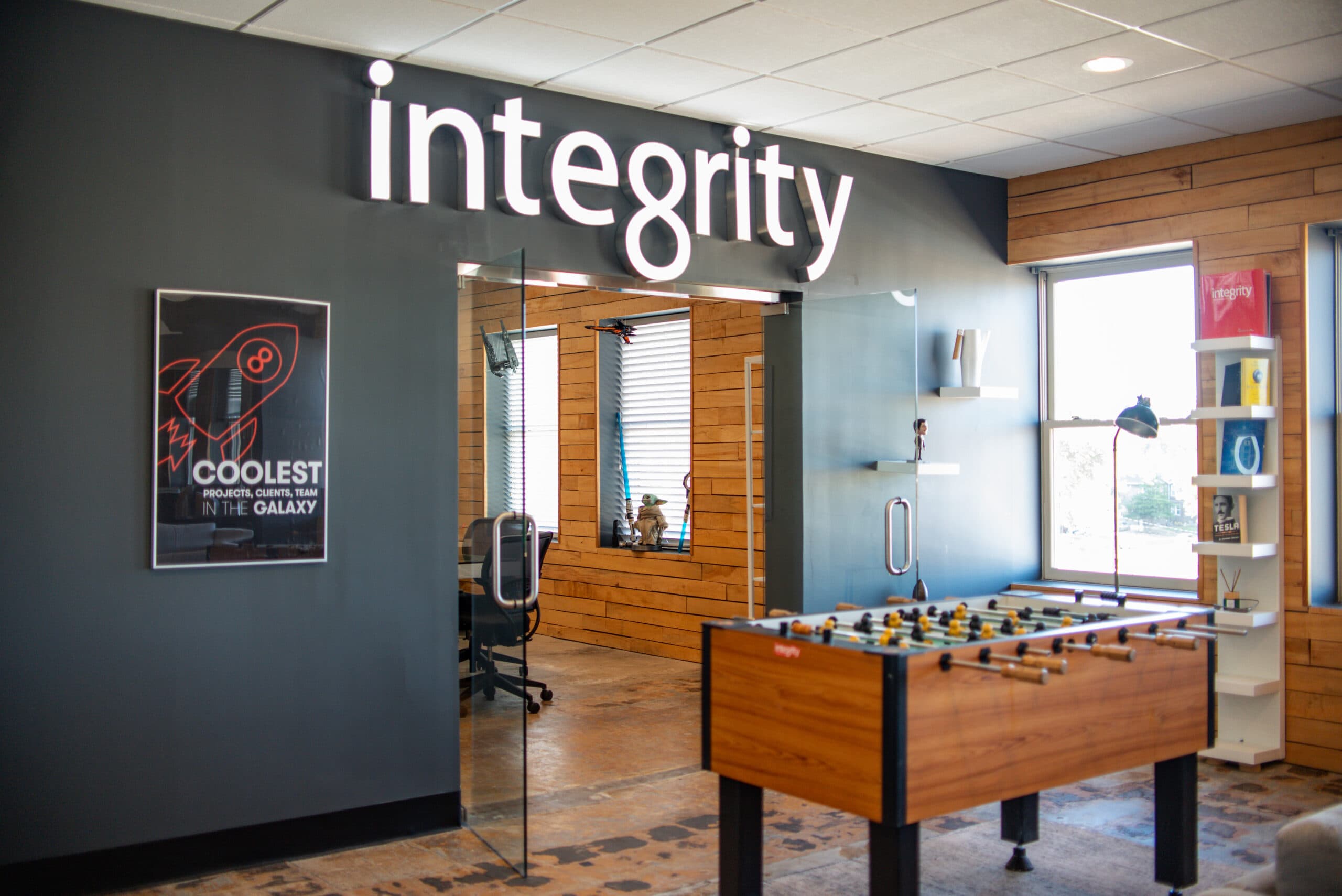 Neon Integrity sign in the lobby of the St Louis office